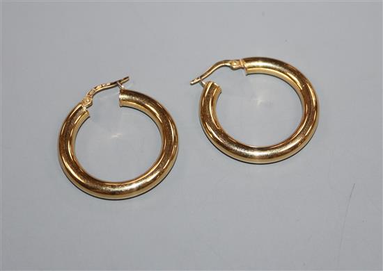 A pair of 18ct gold hoop earrings, 4 grams.